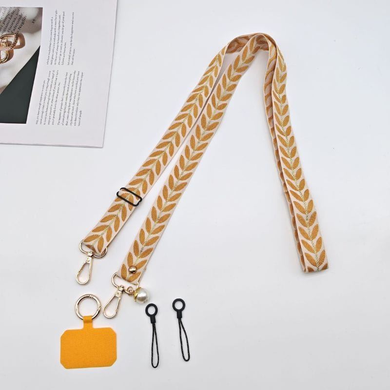 Bandoulière jaune à mettre autour du cou pour téléphone avec détail perle