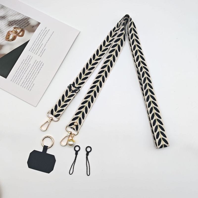 Bandoulière noire pour téléphone avec détail perle