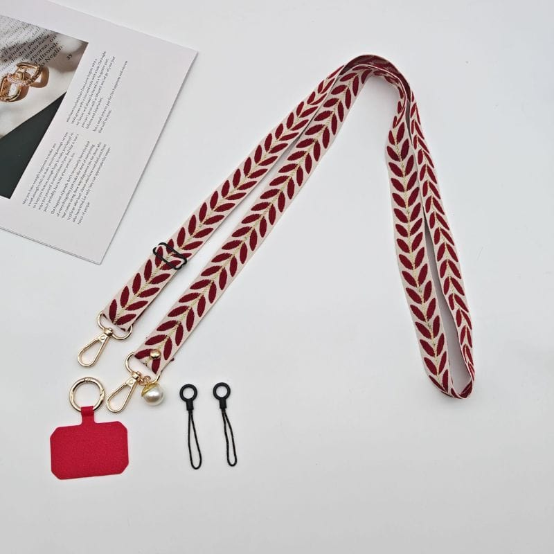 Bandoulière rouge pour téléphone avec détail perle